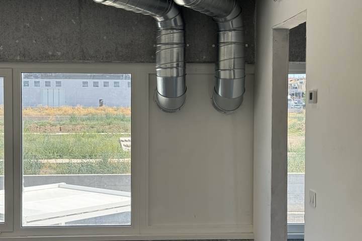 Uscite VMC in spazio uffici finito